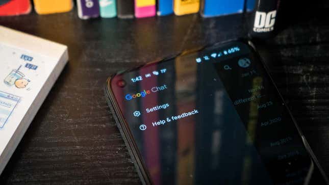 A photo of a phone on the Google Chat screen