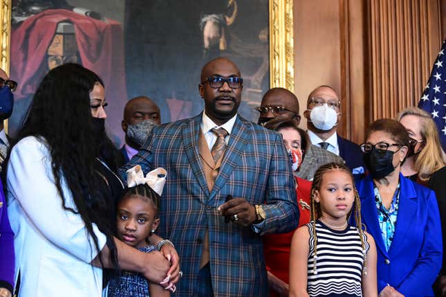 Philonise Floyd, George Floyd’s brother, speaks to reporters while standing with members of the Floyd family at the U.S. Capitol in Washington.