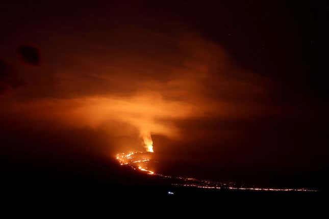 Lava flows from the Mauna Loa volcano on December 04, 2022 near Hilo, Hawaii.