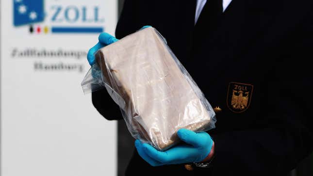 German customs agents shows a package containing confiscated cocaine at a press conference on March 4, 2012 in Hamburg, Germany.