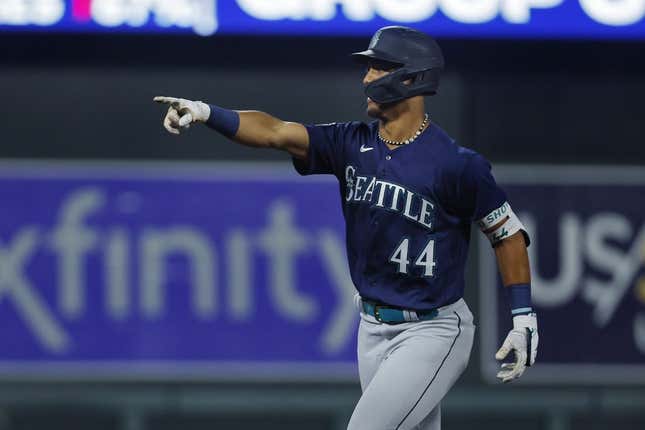 Jul 25, 2023; Minneapolis, Minnesota, USA; Seattle Mariners center fielder Julio Rodriguez (44) celebrates his two-run home run against the Minnesota Twins in the eighth inning at Target Field.