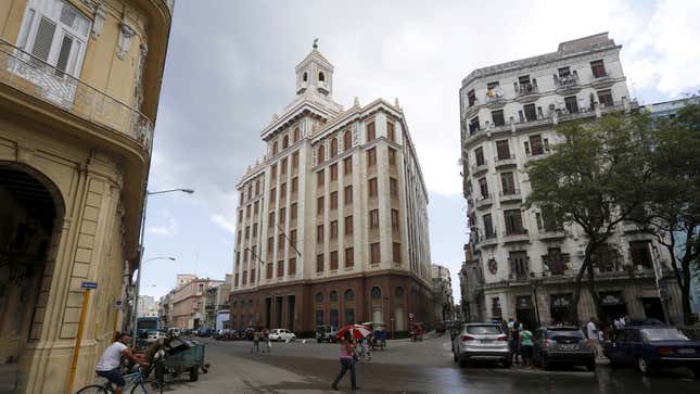 The Bacardi building (C) formerly used as the headquarters of the company is seen in Havana September 18, 2015. The Obama administration announced wide-ranging new rules on Friday to further ease trade, travel and investment restrictions with Cuba, the latest effort to chip away at the long-standing U.S. economic embargo amid a thaw between the former Cold War foes. Bacardi, the largest privately held spirits maker in the world, was among the most successful companies in Cuba before its Cuban assets were seized by the government and its founders exiled in the 1960s. The company said on Friday it was "way too early" to talk about any possible return to the island. "We will need to wait and see what the impacts are," Bacardi said in a statement.