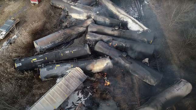 A photo of smoldering train cars following the Ohio crash.