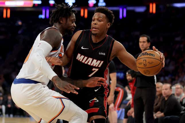 May 2, 2023; New York, New York, USA; Miami Heat guard Kyle Lowry (7) controls the ball against New York Knicks forward Julius Randle (30) during the first quarter of game two of the 2023 NBA Eastern Conference semifinal playoffs at Madison Square Garden.