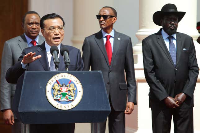 Chinese Prime Minister Li Keqiang delivers a speech next to Rwandan president Paul Kagame (second from the right) in Kenya in 2014.