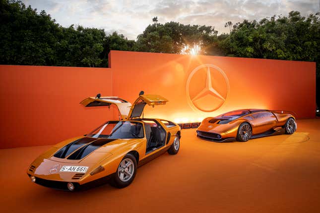 Image of the Mercedes C111-II concept accompanied with the Vision One-Eleven concept behind.