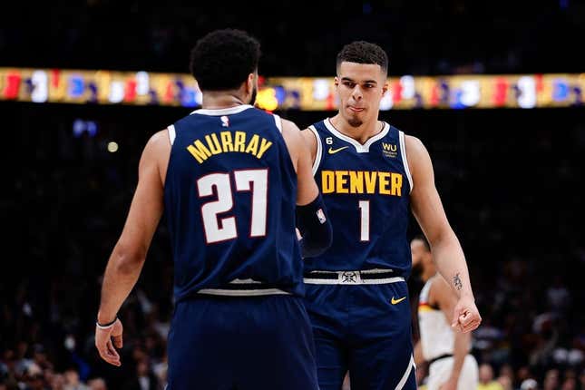 Apr 19, 2023; Denver, Colorado, USA; Denver Nuggets forward Michael Porter Jr. (1) reacts with guard Jamal Murray (27) in the fourth quarter during game two of the 2023 NBA Playoffs at Ball Arena.
