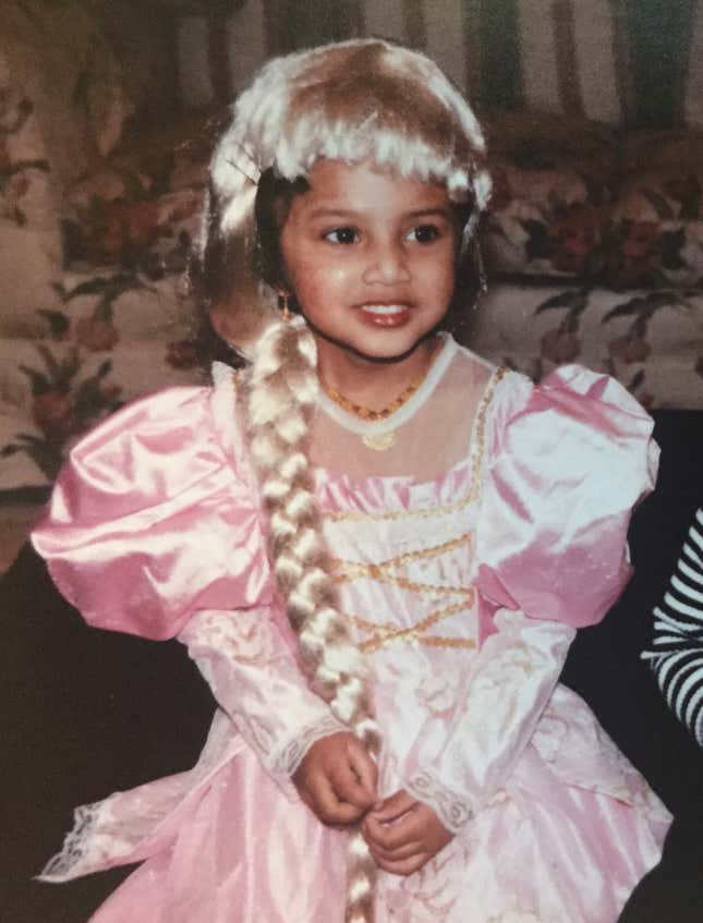 Stock costume? Check. Hair isn’t a racial stereotype but central to the character? Check. My brown self dressed as a white princess? Totally ok.