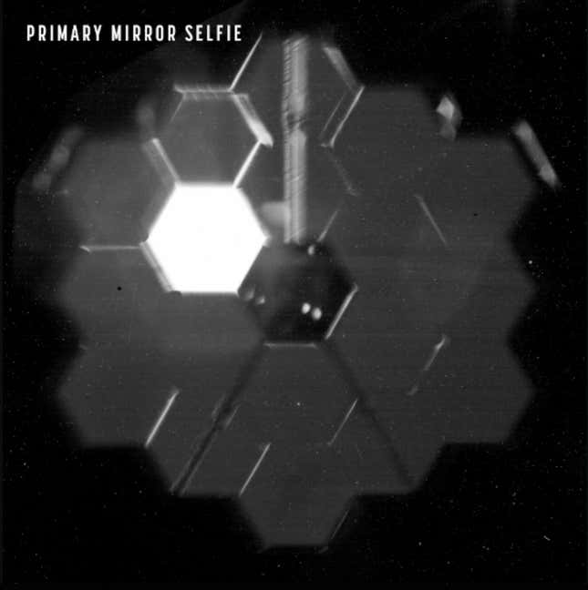 A selfie taken by the Webb Telescope, showing the hexagonal pattern of the primary mirrors.