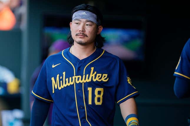 Sep 5, 2022; Denver, Colorado, USA; Milwaukee Brewers first baseman Keston Hiura (18) in the dugout in the ninth inning against the Colorado Rockies at Coors Field.
