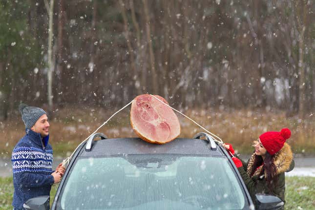 Image for article titled Christmas Ham Strapped To Roof Of Car