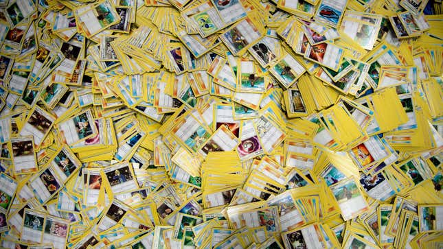 A photo of a ton of open Pokemon cards.
