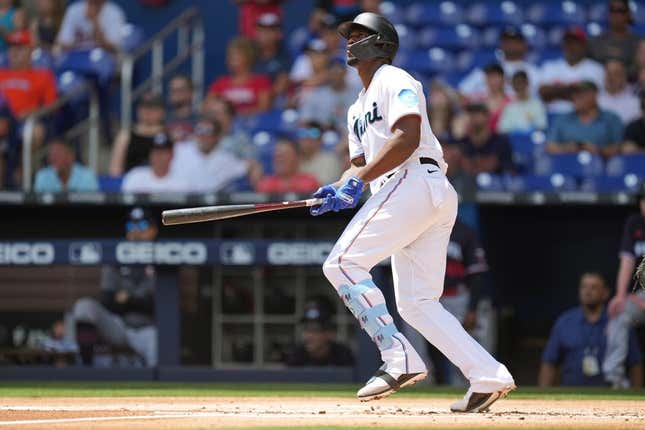 Apr 5, 2023; Miami, Florida, USA;  Miami Marlins left fielder Jorge Soler (12) hits a home run against the Minnesota Twins in the first inning at loanDepot Park.