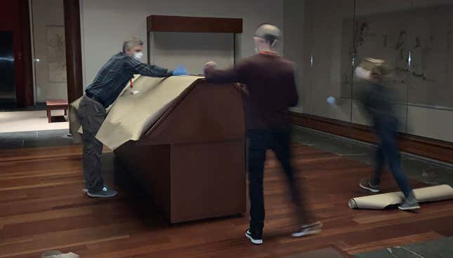 Image of Met Collection Monitors inspecting works during the lockdown