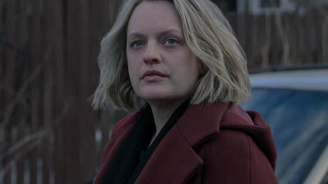 Elisabeth Moss as June Osborne in season four of The Handmaid’s Tale wears a subdued red coat.
