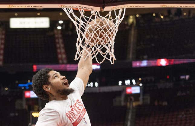 Mar 11, 2023; Houston, Texas, USA; Houston Rockets guard Daishen Nix (15) dunks during warms ups before playing against the Chicago Bulls at Toyota Center.