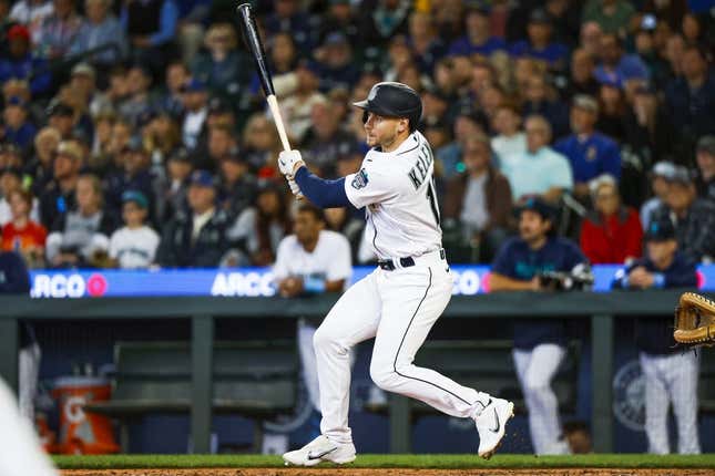 Jun 18, 2023; Seattle, Washington, USA; Seattle Mariners left fielder Jarred Kelenic (10) hits a three-run triple against the Chicago White Sox during the eighth inning at T-Mobile Park.
