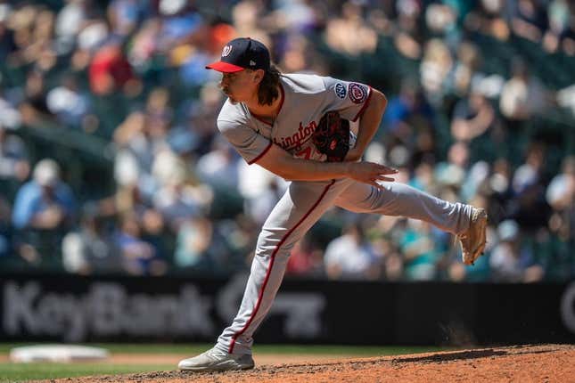 Jun 28, 2023; Seattle, Washington, USA; Washington Nationals reliever Hunter Harvey (73) delivers a pitch against the Seattle Mariners  at T-Mobile Park.