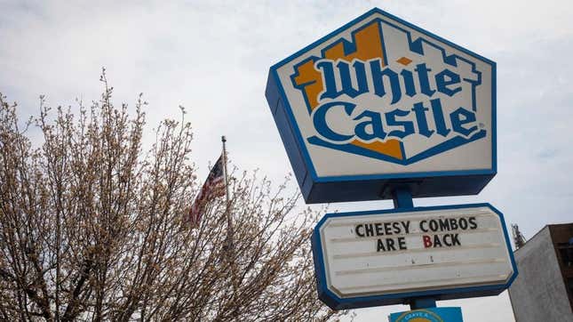 White Castle sign against cloudy sky