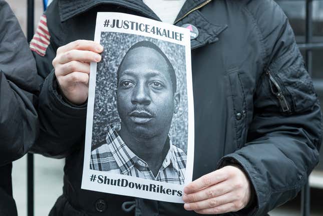 A demonstrator holds an image of Kalief Browder at a protest near City Hall in New York City, NY, USA to demand that it close the long-controversial Rikers Island Corrections facility, on February 23, 2016. 