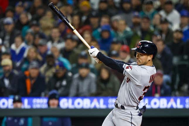 Mar 31, 2023; Seattle, Washington, USA; Cleveland Guardians left fielder Steven Kwan (38) hits a two-run single against the Seattle Mariners during the fifth inning at T-Mobile Park.