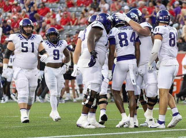 Sep 16, 2023; Houston, Texas, USA; TCU Horned Frogs wide receiver Warren Thompson (84) celebrates his touchdown with teammates against the Houston Cougars in the first half at TDECU Stadium.
