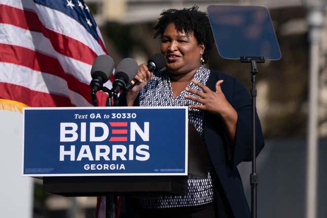 Former US Representative and voting rights activist Stacey Abrams speaks at a Get Out the Vote rally with former US President Barack Obama as he campaigns for Democratic presidential candidate former Vice President Joe Biden on November 2, 2020, in Atlanta, Georgia.