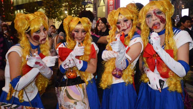 Women wear Sailor Moon outfits and gory makeup.