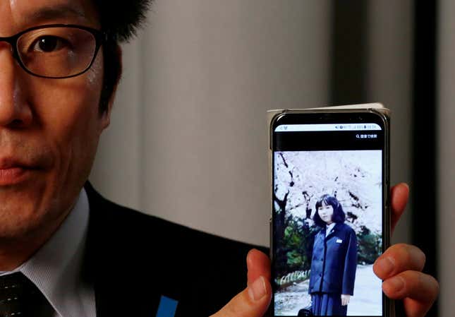 Takuya Yokota shows a picture of his sister Megumi Yokota, a Japanese national abducted by North Korean agents decades ago.