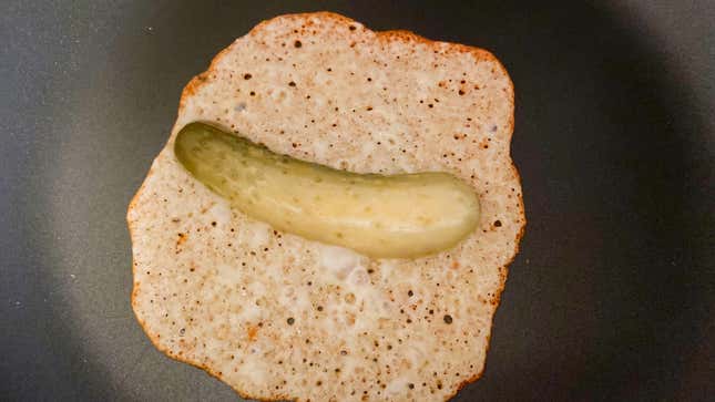 Image for article titled Tuck a Pickle Into a Crispy Cheese Blanket