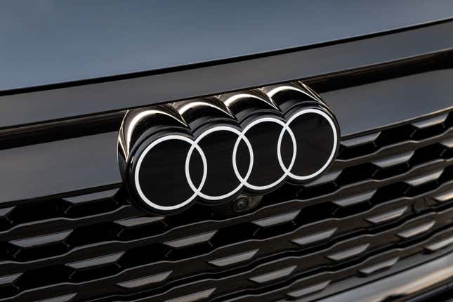 Audi's new flat-design logo on the front of a 2024 Audi Q8 E-Tron SUV.