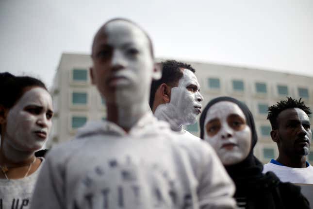 Protesting in front of the Rwanda embassy in Herzeliya, Israel.