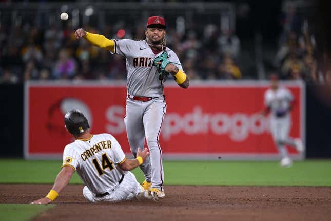 Apr 3, 2023; San Diego, California, USA; Arizona Diamondbacks second baseman Ketel Marte (4) throws to first base after forcing out San Diego Padres designated hitter Matt Carpenter (14) at second base to complete a double play during the third inning at Petco Park.