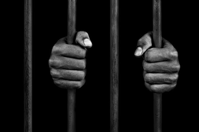 Black woman behind bars