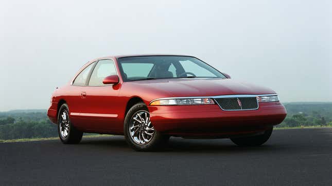 Red Lincoln Mark VIII front three-quarter angle view