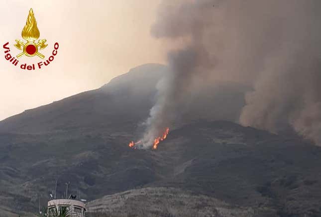 Smoke rises from the volcano on the island of Stromboli.