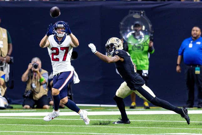 Aug 27, 2023; New Orleans, Louisiana, USA;  Houston Texans wide receiver Adam Humphries (27) catches a pass against New Orleans Saints cornerback Alontae Taylor (1) during the first half at the Caesars Superdome.