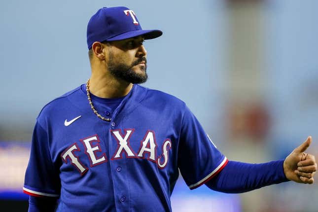 Apr 25, 2023; Cincinnati, Ohio, USA; Texas Rangers starting pitcher Martin Perez (54) walks off the field at the end of the sixth inning in the game against the Cincinnati Reds at Great American Ball Park.