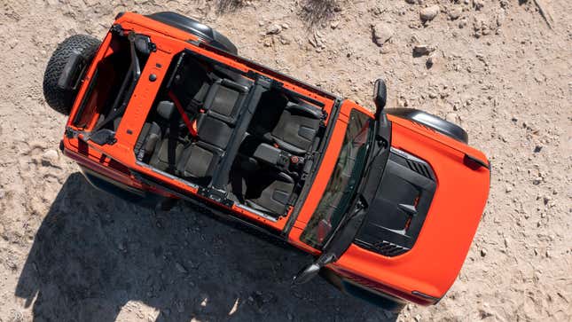 A photo looking down on a Bronco Raptor with no roof. 