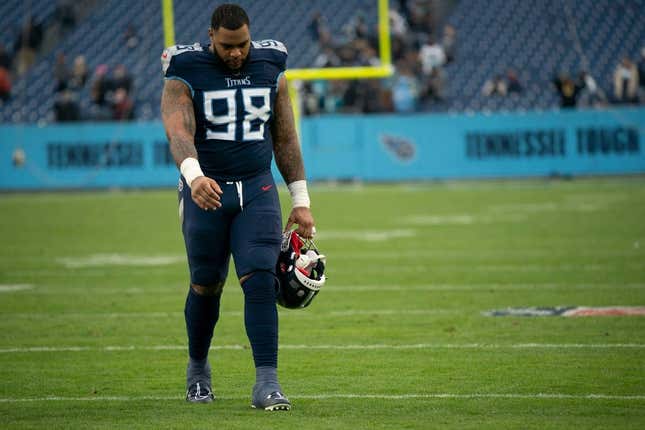 Tennessee Titans defensive tackle Jeffery Simmons (98) walks across the field after their 36 to 22 loss against the Jacksonville Jaguars at Nissan Stadium Sunday, Dec. 11, 2022, in Nashville, Tenn.  Nfl Jacksonville Jaguars At Tennessee Titans