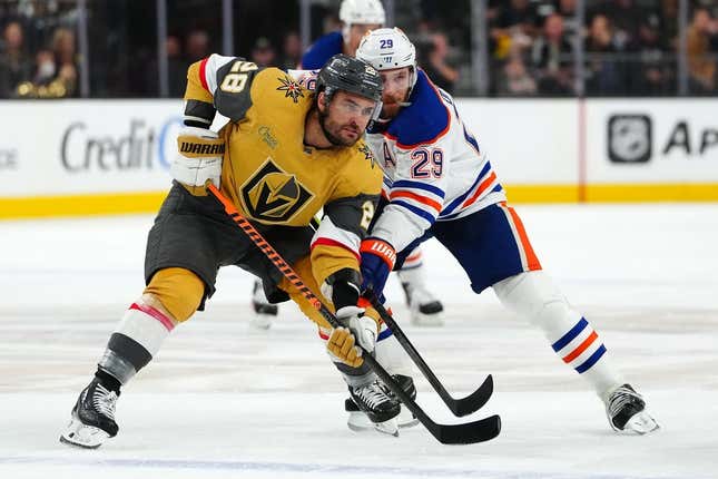 May 3, 2023; Las Vegas, Nevada, USA; Vegas Golden Knights left wing William Carrier (28) jostles with Edmonton Oilers center Leon Draisaitl (29) during a first period face off in game one of the second round of the 2023 Stanley Cup Playoffs at T-Mobile Arena.