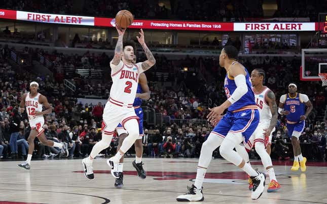 Jan 14, 2022; Chicago, Illinois, USA; Chicago Bulls guard Lonzo Ball (2) looks to pass the ball against the Golden State Warriors during the first half at United Center.