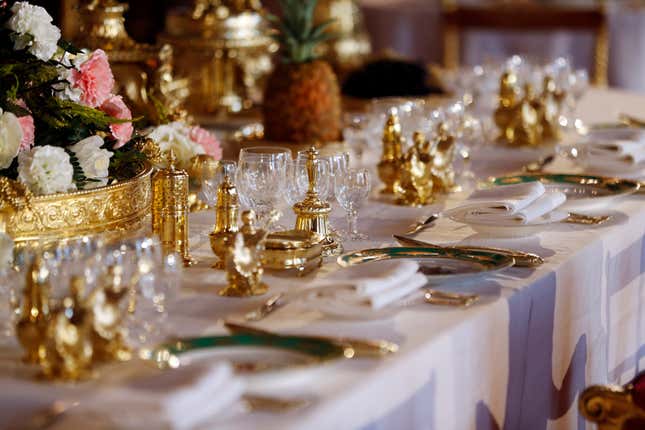 A table dressed to evoke the settings of Britain's Queen Elizabeth II's 1953 Coronation State Banquets.