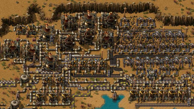 A screenshot shows a large, complex base built in Factorio. 