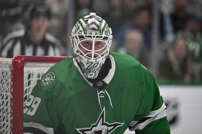 Feb 27, 2023; Dallas, Texas, USA; Dallas Stars goaltender Jake Oettinger (29) faces the Vancouver Canucks attack in the Stars zone during the third period at the American Airlines Center.