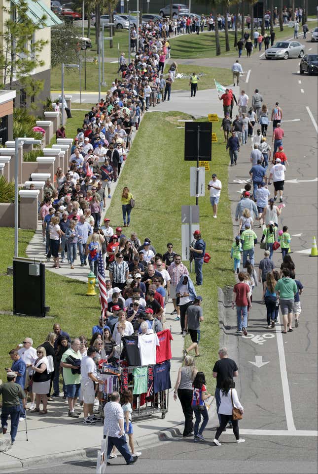 Trump supporters line up for a rally at Florida University.