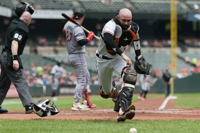 Jul 2, 2023; Baltimore, Maryland, USA;  Baltimore Orioles catcher Anthony Bemboom (37) chases down a pass ball during the first inning against the Minnesota Twins at Oriole Park at Camden Yards.