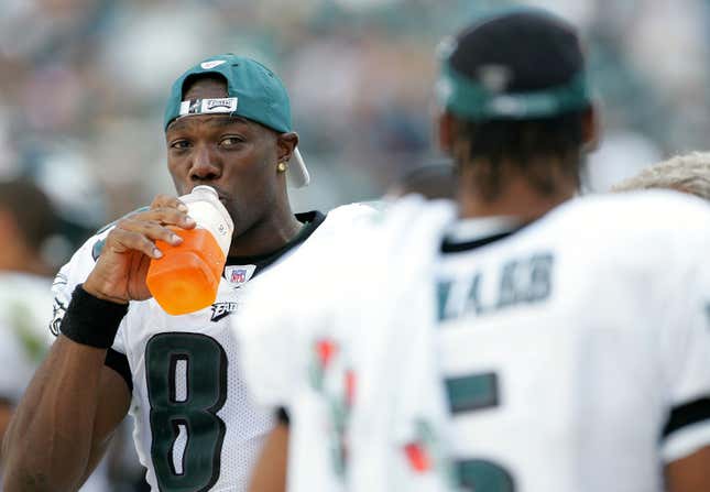 Receiver Terrell Owens speaks with quarterback Donovan McNabb of the Philadelphia Eagles while on the sidelines during the second half of the game against the San Francisco 49ers on Sept. 18, 2005 at Lincoln Financial Field in Philadelphia Pennsylvania. 