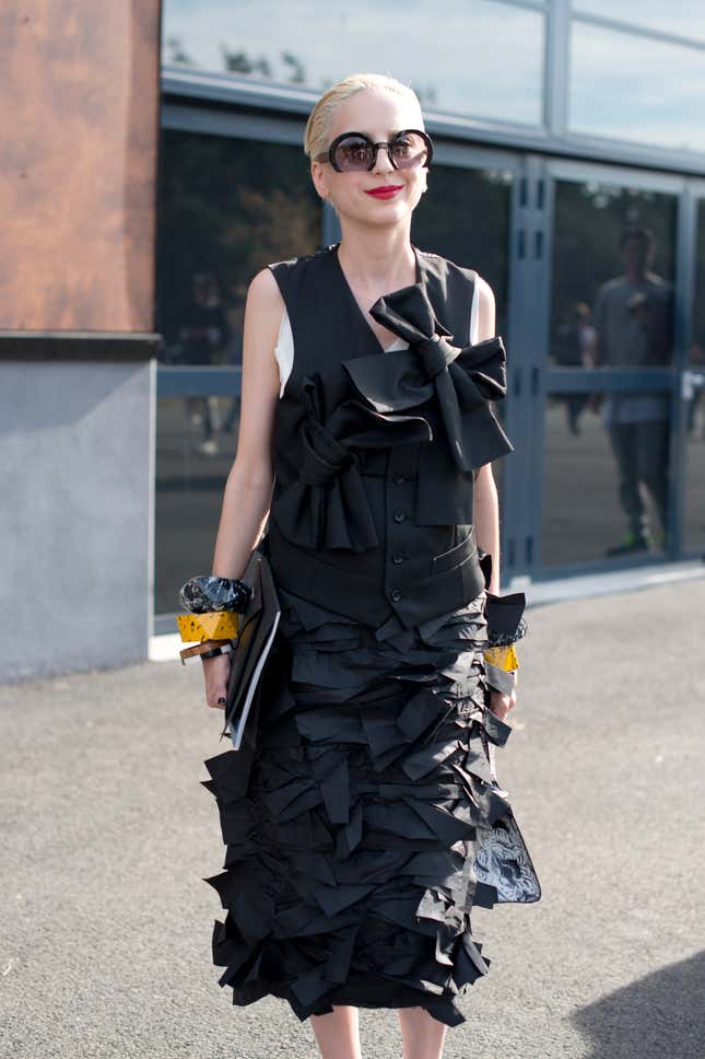 PARIS, FRANCE - JUNE 28: A Guest wears a Comme des Garcons dress, and Miu Miu sunglasses on day 5 of Paris Fashion Week Menswear Spring/Summer 2016 on June 28, 2015 in Paris, France. (Photo by Kirstin Sinclair/Getty Images)