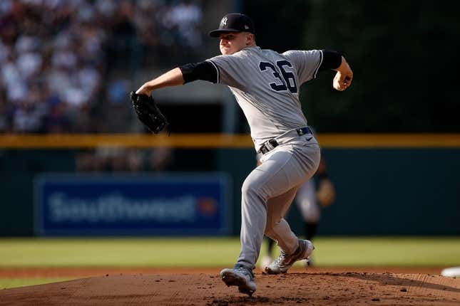 Jul 15, 2023; Denver, Colorado, USA; New York Yankees starting pitcher Clarke Schmidt (36) pitches in the first inning against the Colorado Rockies at Coors Field.